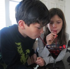 My eldest two fighting for a sip!