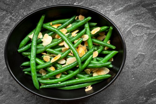 Green Beans with Toasted Almonds in Black Bowl